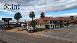 Red Hills housing development -two story white building with red roof